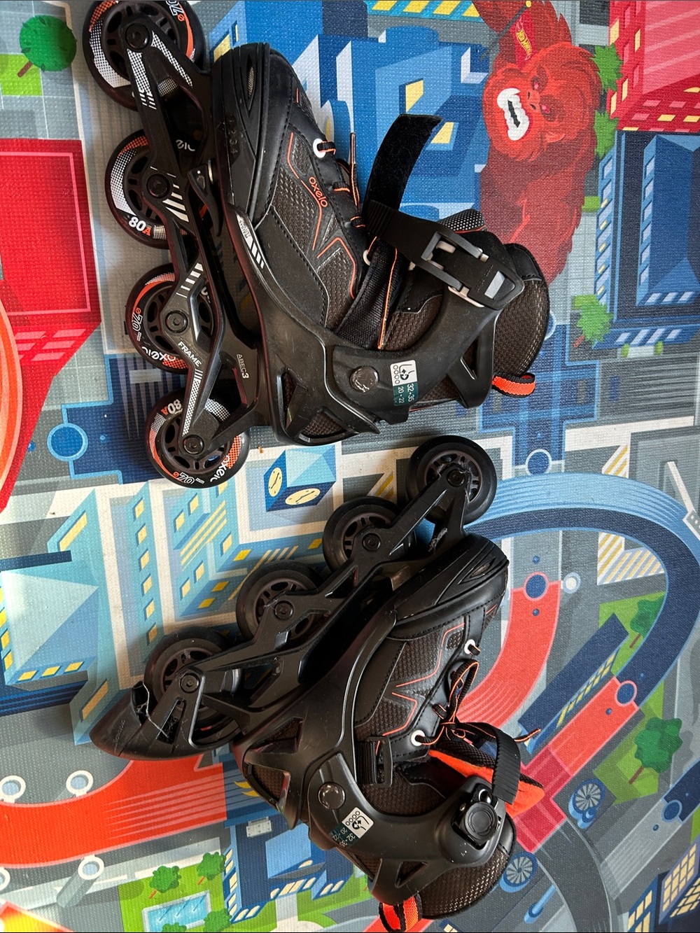 Youth Black and Orange Adjustable Inline Skates max 132 lbs